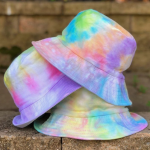 Embrace the tie-dye trend with a vibrant bucket hat! Explore pre-made options, unleash your creativity with DIY kits, and discover how to incorporate tie-dye into your entire wardrobe.