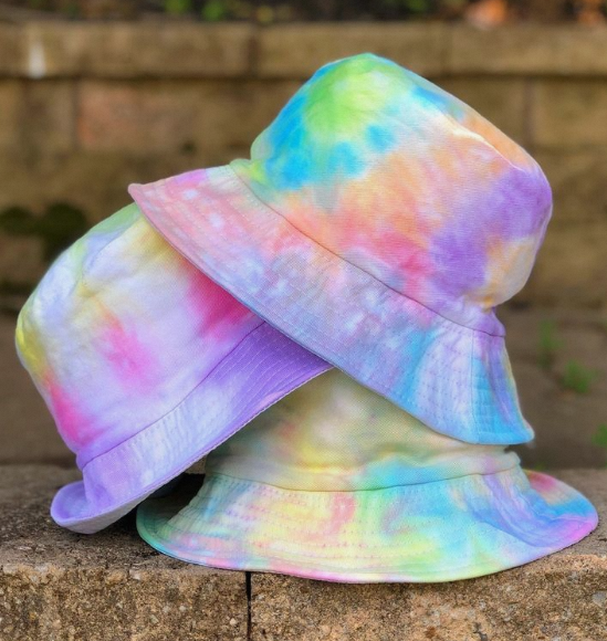 Embrace the tie-dye trend with a vibrant bucket hat! Explore pre-made options, unleash your creativity with DIY kits, and discover how to incorporate tie-dye into your entire wardrobe.