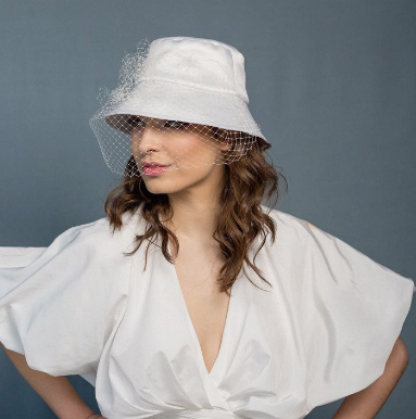 Transform your look with a chic Hat with Veil. Perfect for weddings, church or vintage-themed events. Elevate your style in classic elegance