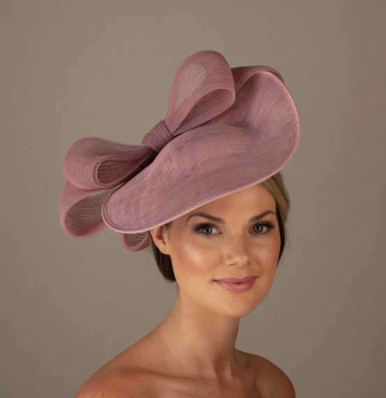 Derby Hats, also known as Bowler Hats, are iconic symbols of classic British fashion and elegance.