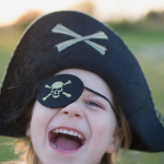 Explore the history, diverse styles, and creative ways to wear pirate hats. Find the perfect pirate hat to complete your look and set sail on an adventure!