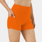 Add a pop of energy to your activewear with Orange Biker Shorts. High-performance, moisture-wicking fabric ensures comfort and style during workouts or casual wear.