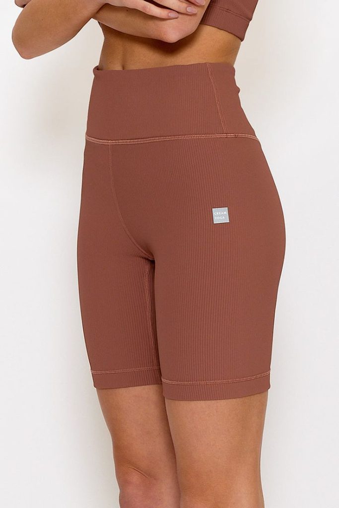 Upgrade your activewear with Brown Biker Shorts. Versatile and fashionable, these shorts offer a comfortable fit for workouts or casual wear, adding a touch of edge to your style.
